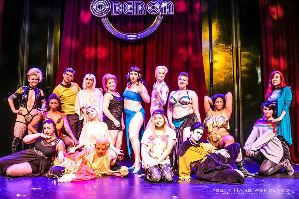 Cast photo of Final Frontease, featuring a dozen Star Trek inspired costumes in various states of undress